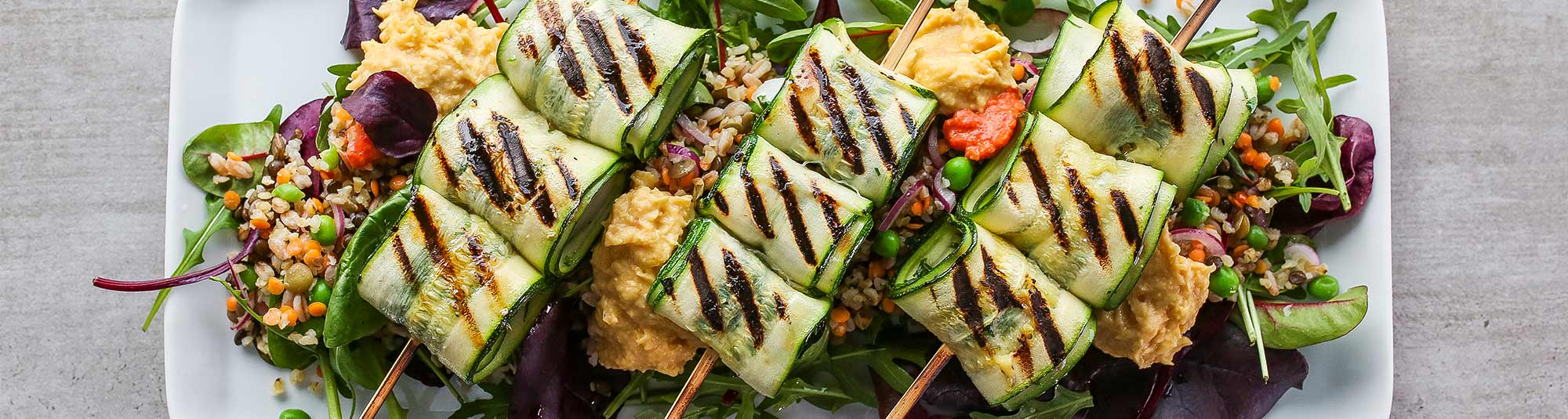 Grillat torskspett av gourmetbitar torsk lindad i squash