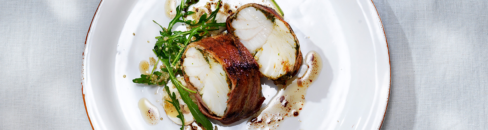 Baconstekt Torskrygg med quinoa, ruccola och parmesan