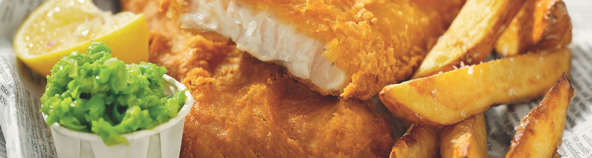 Fish and chips med pommes och ärtröra