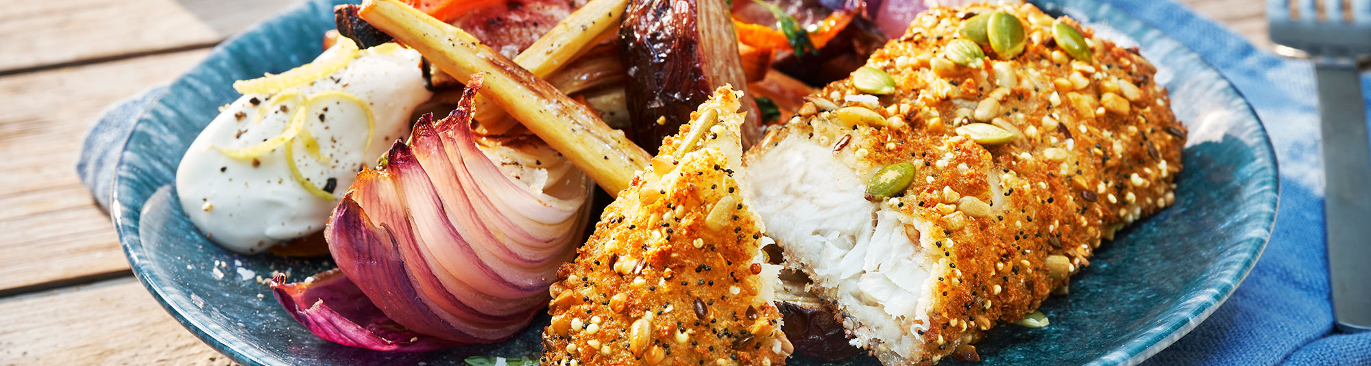 Ugnsrostade rotfrukter med fröbakad fiskfilé och citronsås